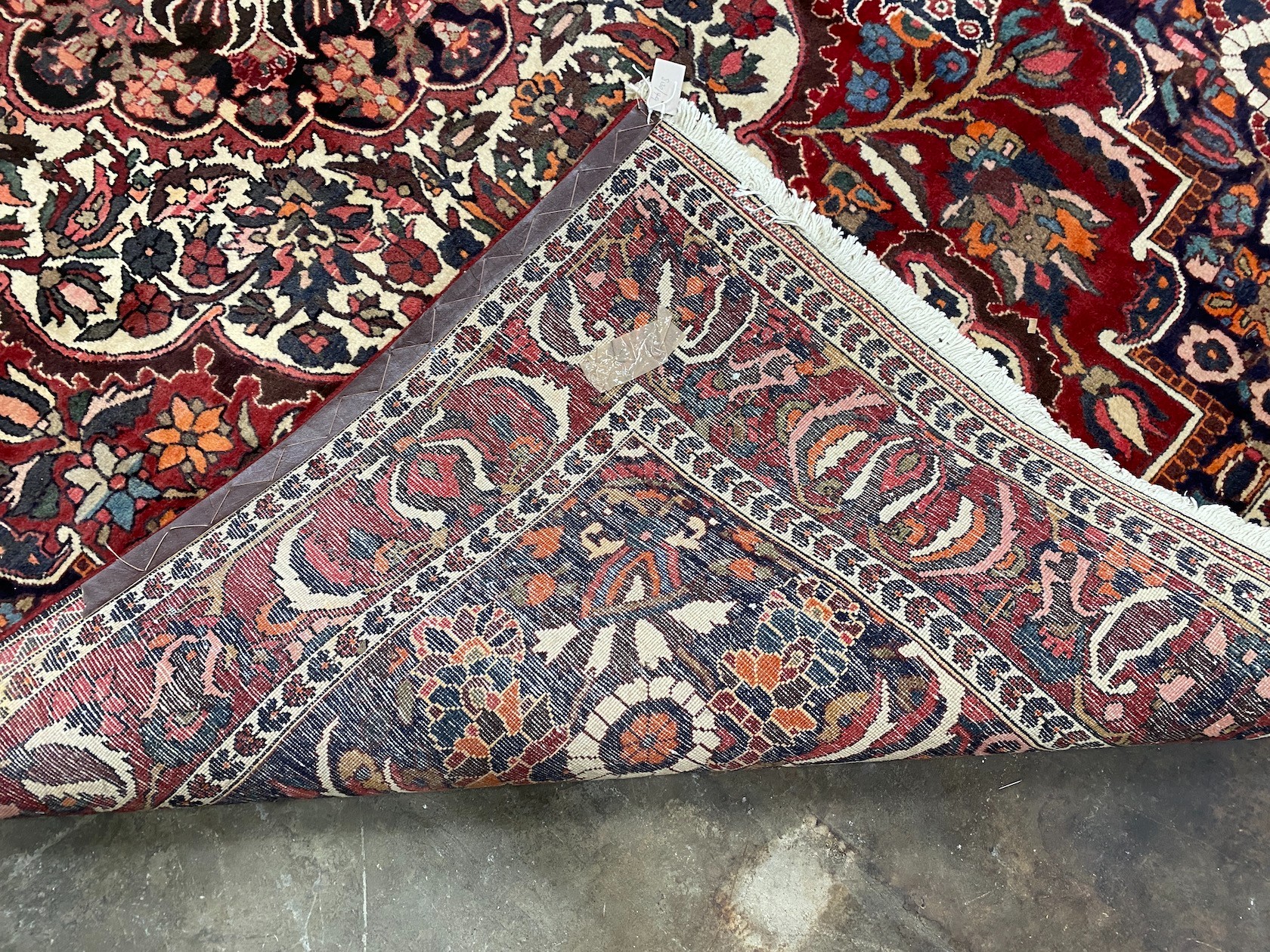 A Mahal burgundy ground carpet, 320 x 210cm